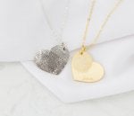 White Fashion accessory Material property Metal Pendant